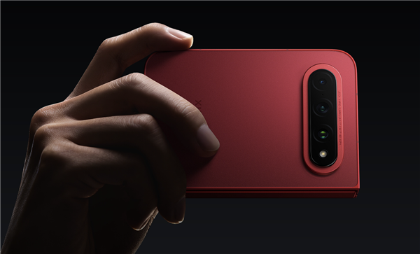 Xiaomi 18 Fold in red held in one hand