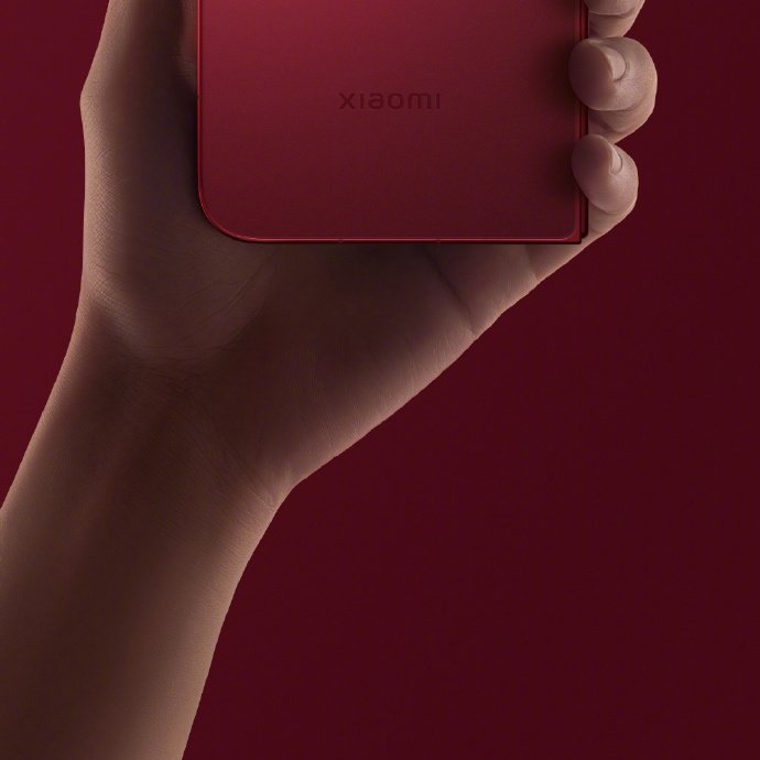 Xiaomi 18 Fold Xiye Red held in hand showing rear finish